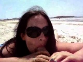 Chupar pau grande na praia